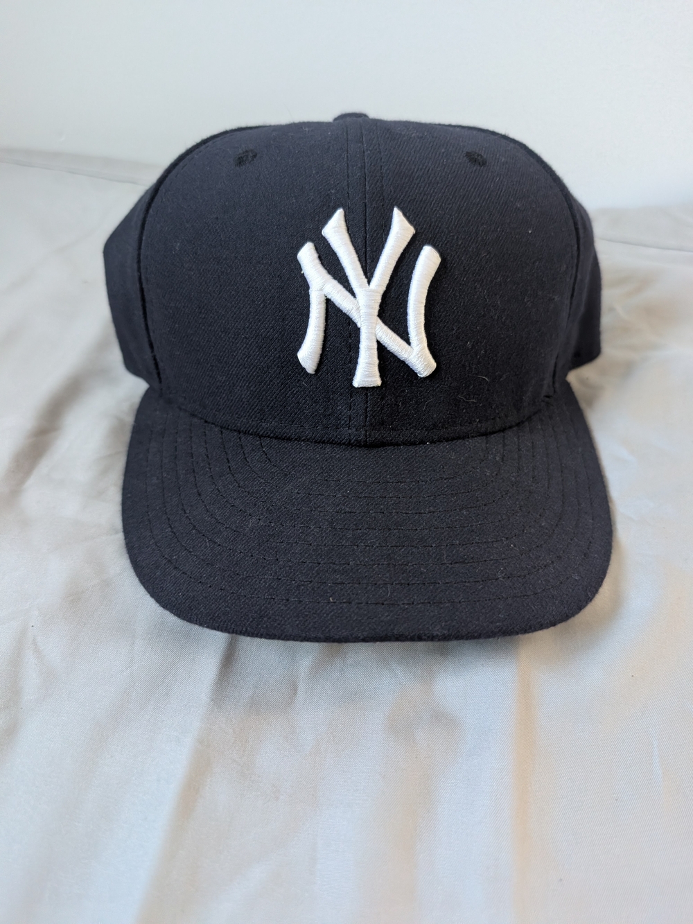 New Era Black Cap with White NY Emblem